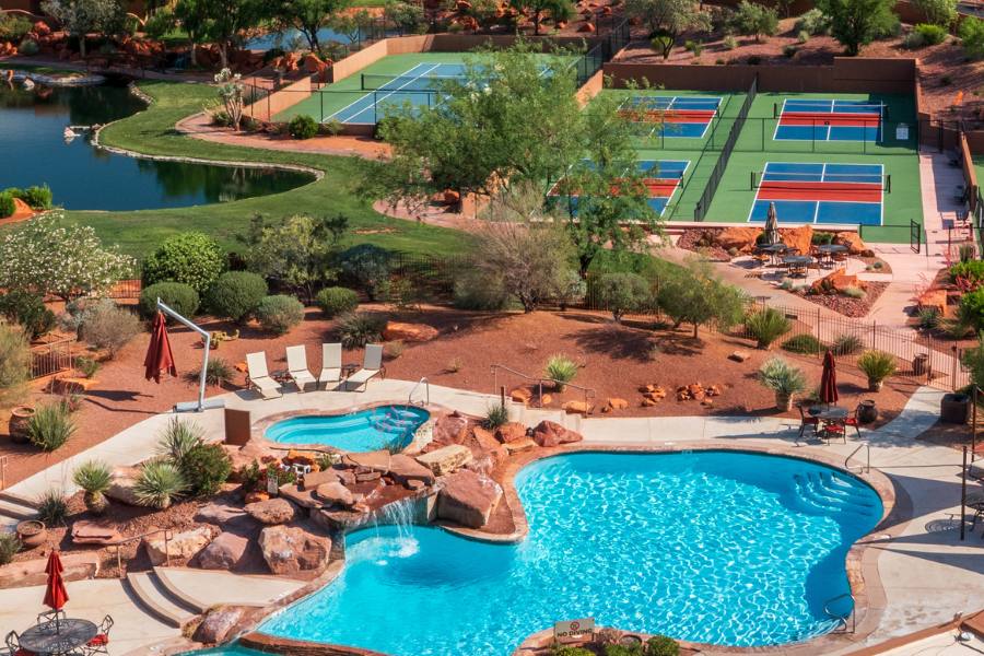 Resort pool and hot tub with mountain views at a luxury St. George retreat in Southern Utah.