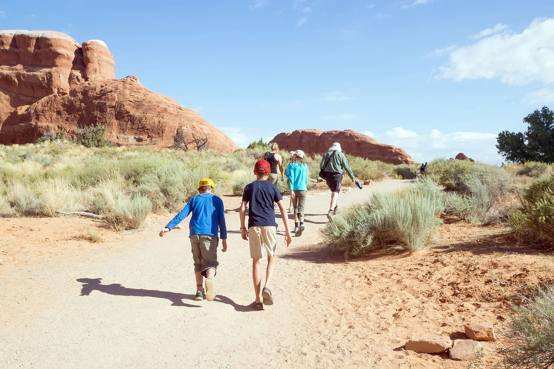 A family hiking in a park in Utah