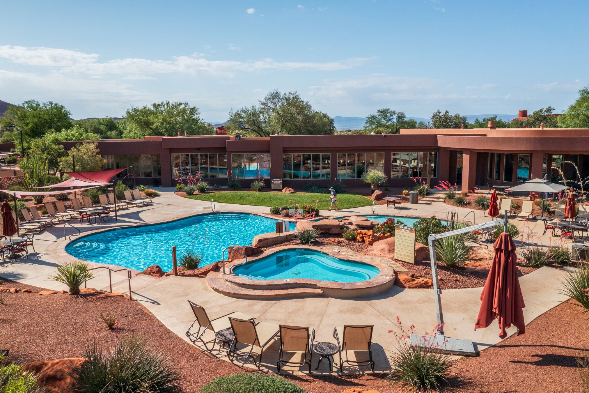 Outdoor pool with lounge chairs