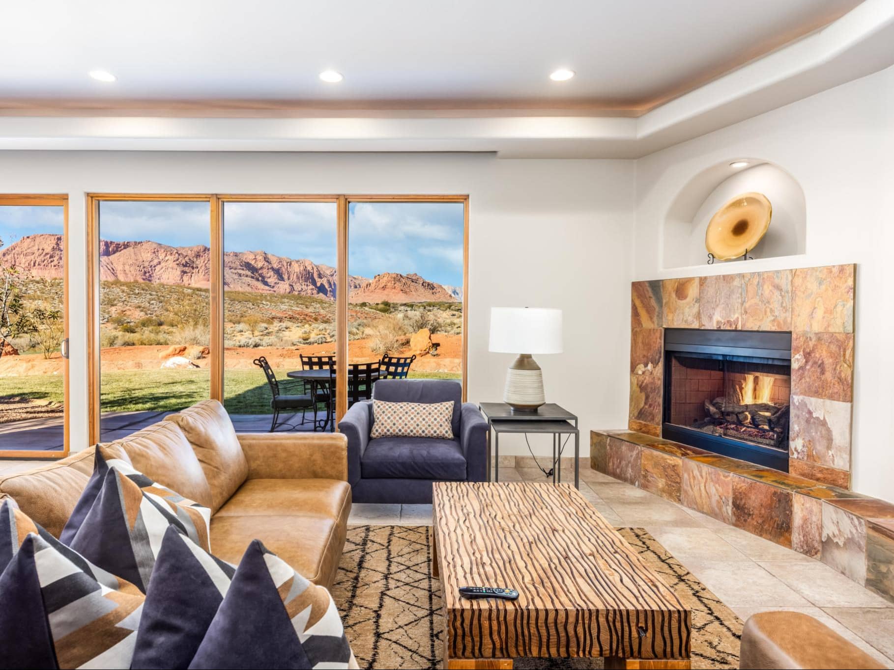 spacious living room with a fireplace at our luxury resort in St. George, UT